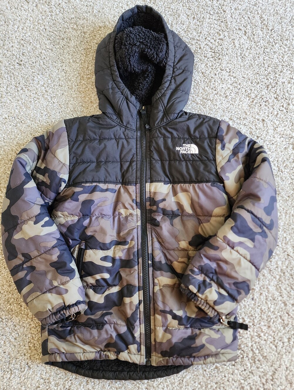 The North Face Camouflage Puffer Jacket in Black and Olive YOUTH